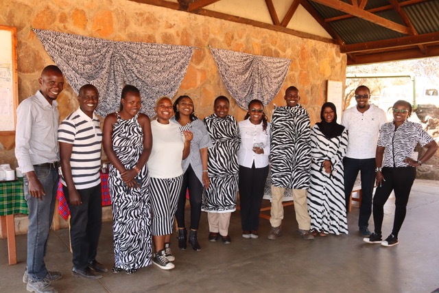 FoHVOS Board President Dan Rubenstein celebrates World Zebra Day with his students from Princeton and Kenya in appropriate attire!