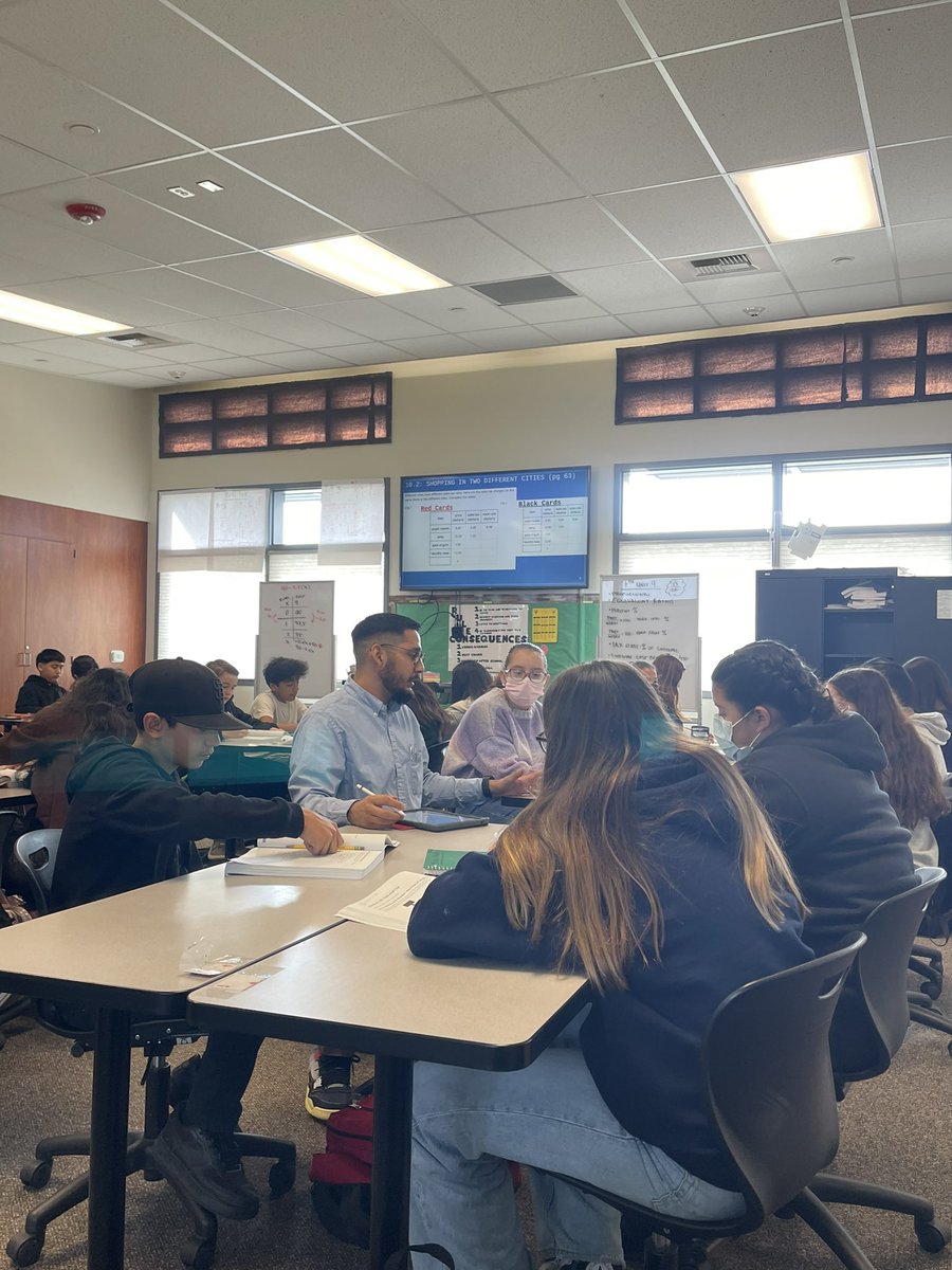 Guerrerotweets's tweet photo. Supporting students every time! Mr. González and Ms. Nieves working in small groups during independent time in math class. #greatertogether #sciastrong https://t.co/o8WdODQJE1