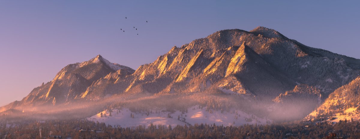 Negative temperatures and first light on the Boulder Flatirons this morning.