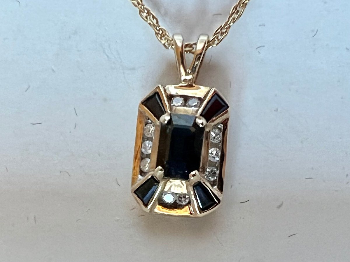 In my #etsy shop: Art Deco Inspired Sapphire and Diamond 9 Ct Yellow Gold Pendant 9 Ct Chain #lovefriendship #sapphirependant #Decoinspired #diamondpendant #valentine etsy.me/3XTS6dc