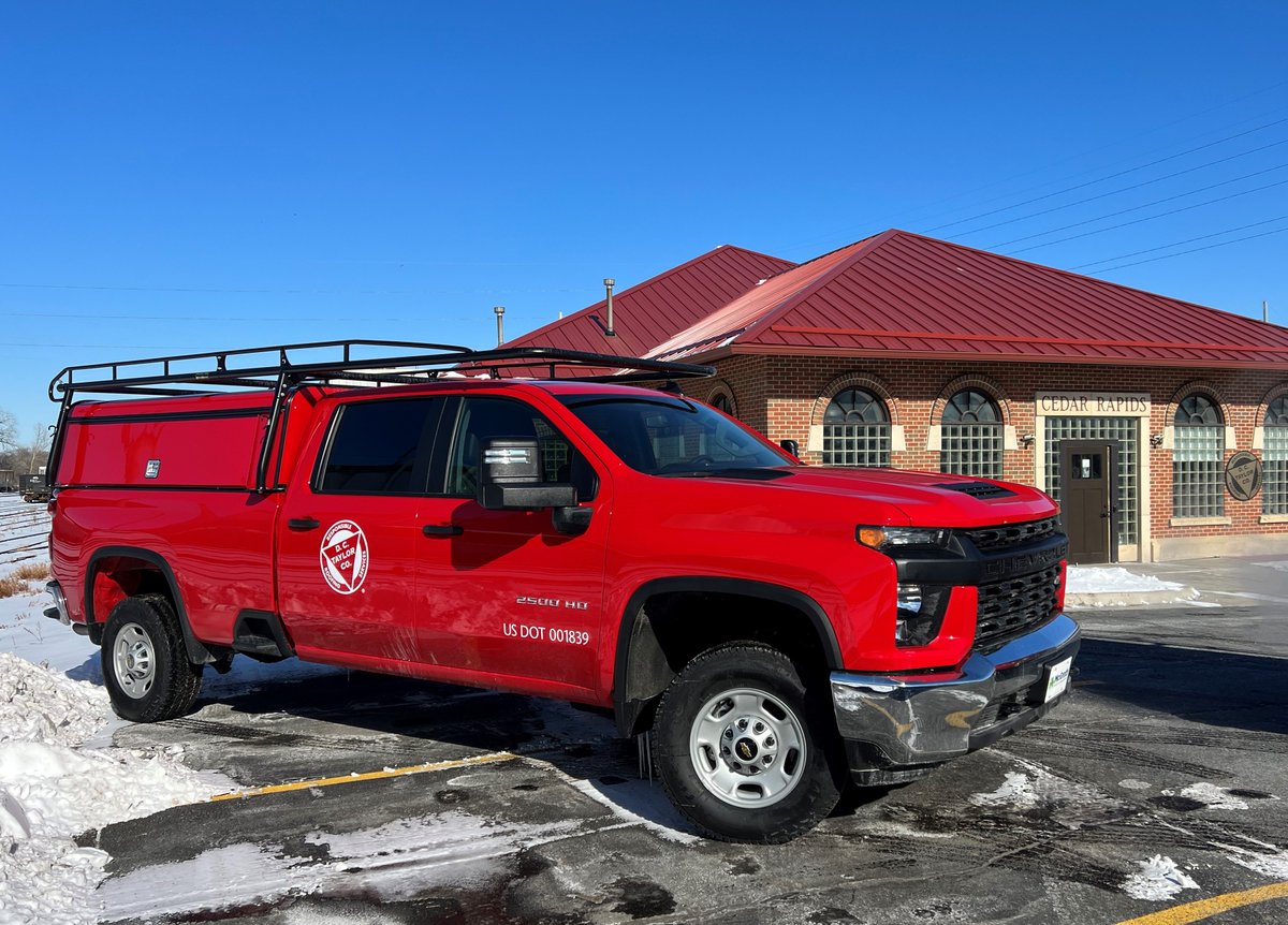 DCTaylorCo's tweet photo. New truck day! These trucks will be going to our crews in California, Illinois, and Iowa. It's below zero (with the wind chill) here today in Iowa. Thank you to everyone who helped with these photos on such a chilly day! #safety #roofing #redtrucks #iowa #california #Illinois https://t.co/qZW8ghz1iF