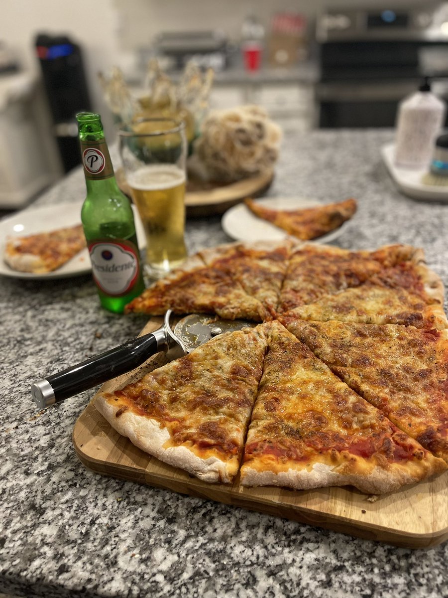 First Pizza on the XL <a href="/BigGreenEgg/">Big Green Egg</a>  paired with a Presidente. Easy…8-9 minutes at 500 deg