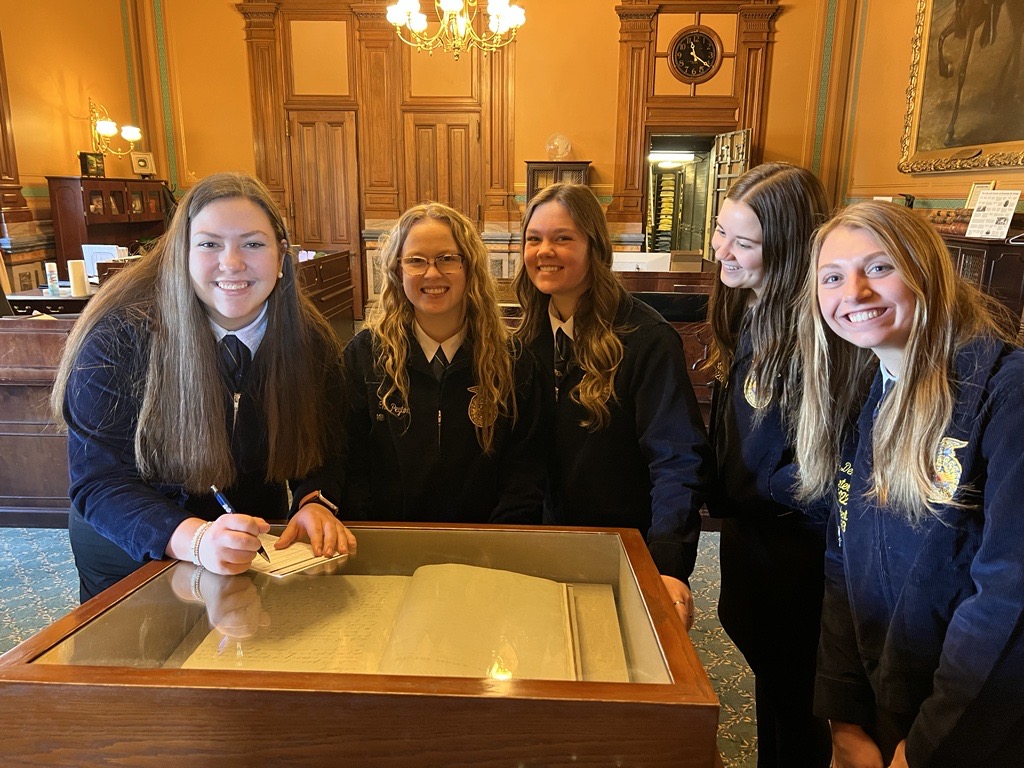 IowaSOS's tweet image. It’s @iowaffa Association Day on the Hill! While visiting the Iowa Capitol, FFA members met with legislators &amp;amp; many stopped by my office. Several registered to vote atop the case containing the original 1857 Iowa Constitution! The future of agriculture is BRIGHT! #IowaAg #IowaFFA