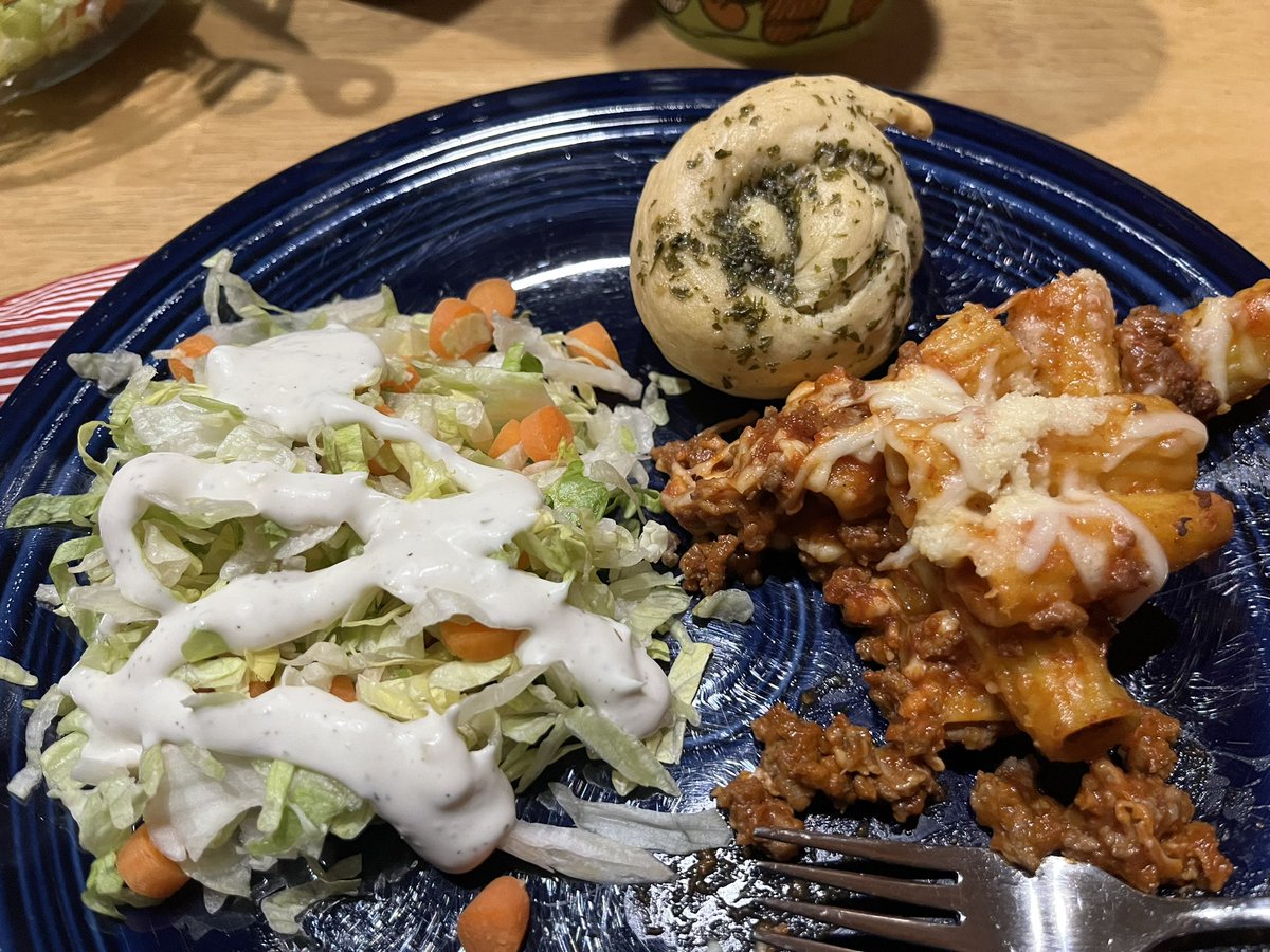 What else do you do on a “snow day” off of school, but bake homemade garlic knots to go along with our baked rigatoni.