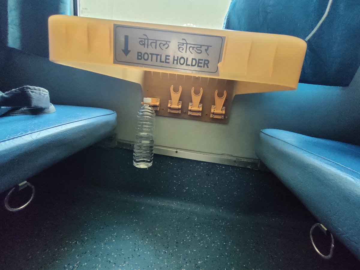 Keeka92's tweet photo. The worst step ladder and bottle holder design I've ever seen in a train by the Indian Railways. The older ones were so much better!! Function over Aesthetics please..

@RailMinIndia @PiyushGoyal https://t.co/vtgZ8ECmmy