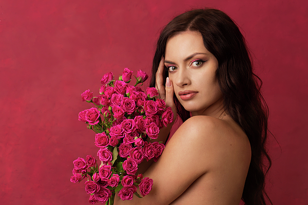 New artwork for sale! - "A beautiful woman with a bare shoulder is holding a bouquet of pink roses on a pink background" - fineartamerica.com/featured/a-bea… @fineartamerica