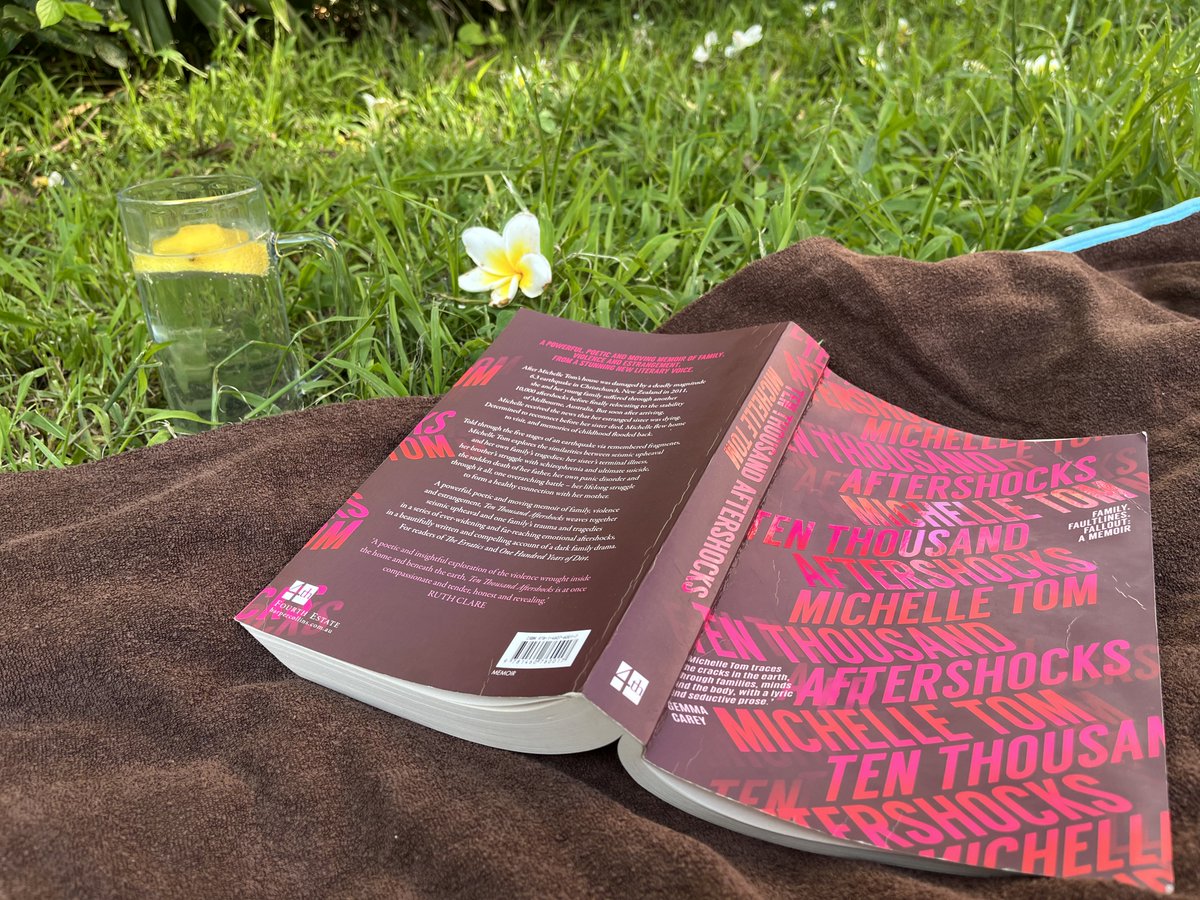 Perfect end to a hectic day. Lying on the grass reading @m_tom_writer's beautifully written, highly absorbing memoir #TenThousandAftershocks. So glad you wrote it, Michelle, and can't wait to read more from you.💮