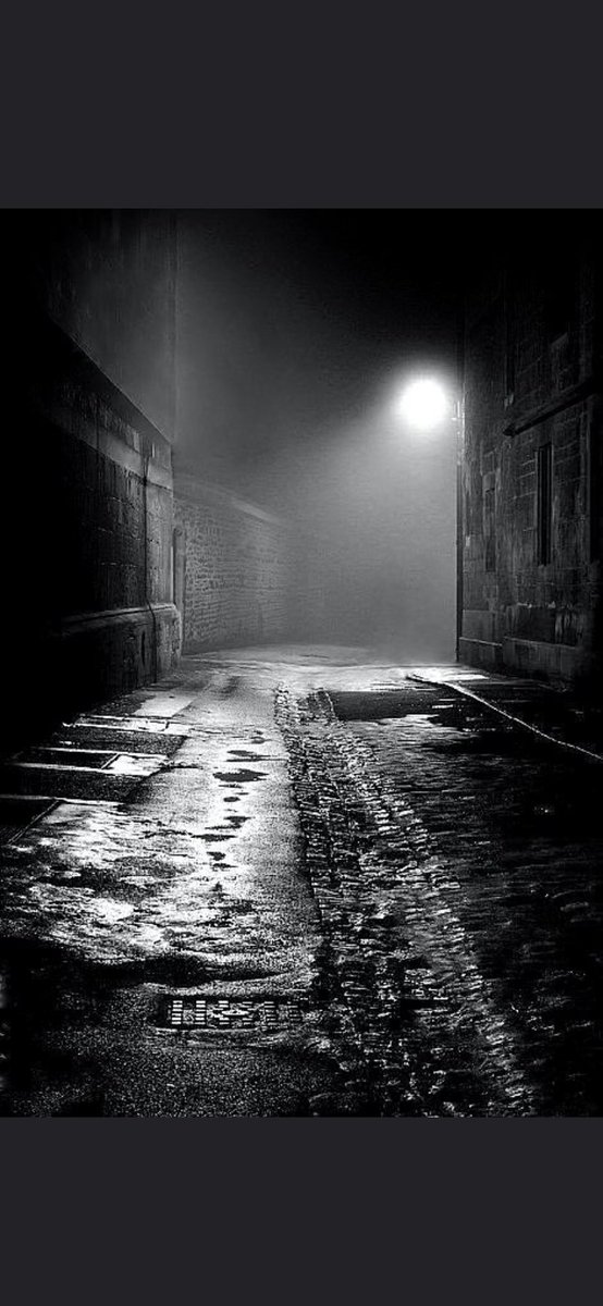 Forlorn footsteps echo night’s familiar malady as solitude’s sorrow thrums its mournful melody. Dark, foreboding, cold corners provoke urgency to withdraw, yet lamplight’s muted, misty glow conjures yearnings to explore.