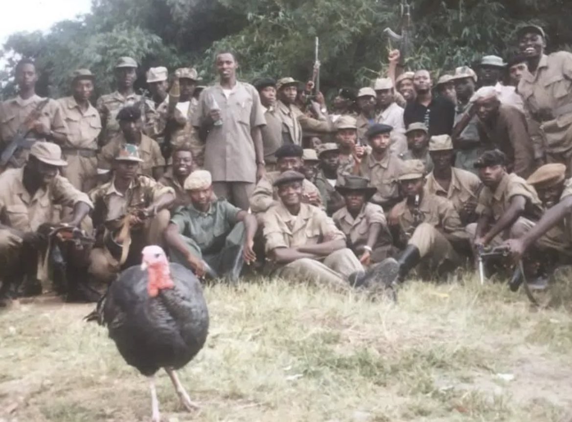 Back in 90s, for the love of animals INKOTANYI choose to take this picture with a turkey 🦃. LOVE animals. Be KIND to animals. HAPPY HEROES DAY 🇷🇼 #Ubutwari2023