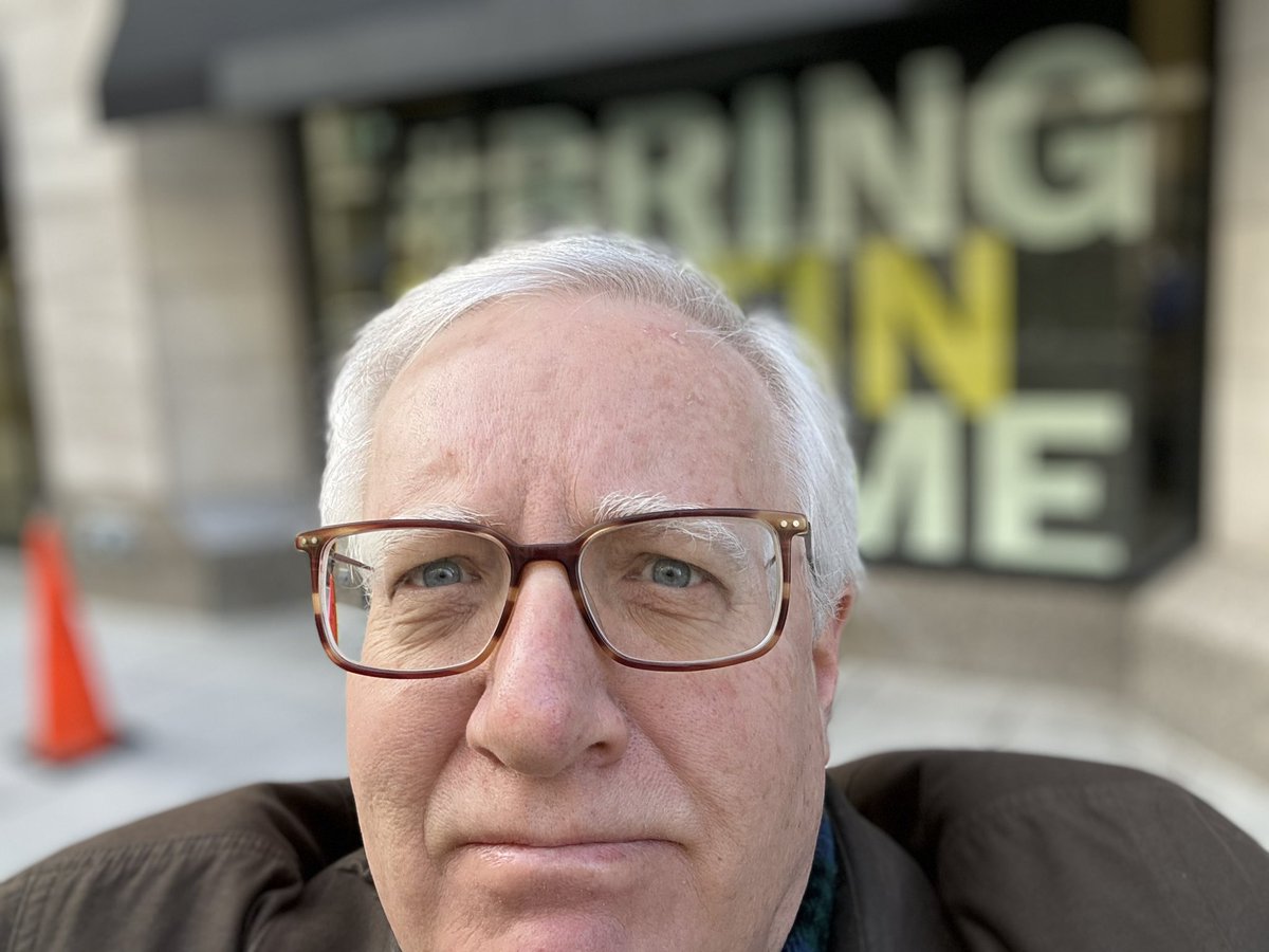 Selfie 2/1/23 by #BringHimHome banner on F Street side of National Press Building. All <a href="/PressClubDC/">National Press Club</a> members encouraged to do same and call on <a href="/jakejsullivan/">Jake Sullivan</a> to contact Syria to begin talks to ultimately #FreeAustinTice. They are waiting. So is Austin. So is <a href="/PressClubDC/">National Press Club</a>.