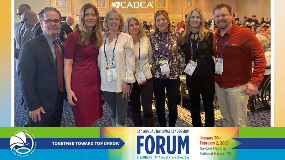 DEAHQ's tweet photo. DEA Administrator Milgram,  Associate Administrator DeLena, and @DEANEWENGLAND Community Outreach Specialist O'Keefe pictured with the team from @RCFY at the #CADCAForum. https://t.co/b1p5uJDv2g