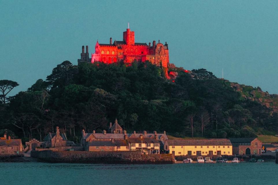 ntmichaelsmount's tweet photo. The castle will be lit red this evening to support the @TheBHF Heart Month which starts today to help raise funds to support the charities life saving work.

Find out more here: https://t.co/5A6cA68Hu0

Image: Colin Higgs
#heartmonth #heart #heartresearch #heartdisease #charity https://t.co/7LOj4q9VK0