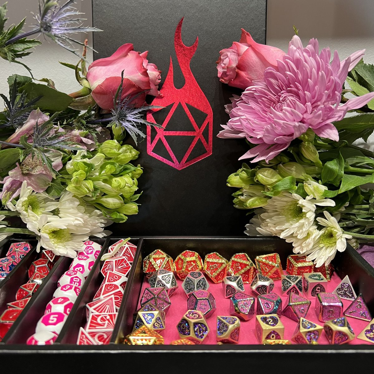 ForgedGamingCo's tweet photo. "Roses are red
Violets are blue 
I rolled a nat. 20 when I fell in love with you."

Check out our February dice pallet! 

#dice #dicepallet #metaldice #dicegoblin #diceaddict #ttrpg #dicecollection #forgedgaming https://t.co/m6wckxBPE0