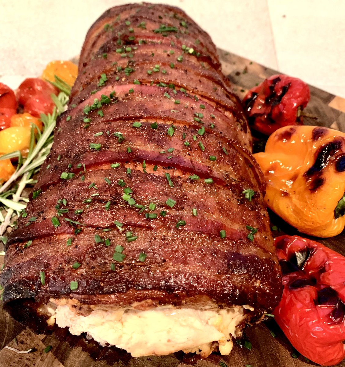 FlamesandRays's tweet photo. Bacon wrapped and cream cheese stuff pork loin off the smoker last night! This was a fun one!! https://t.co/Vtc63ict4N
