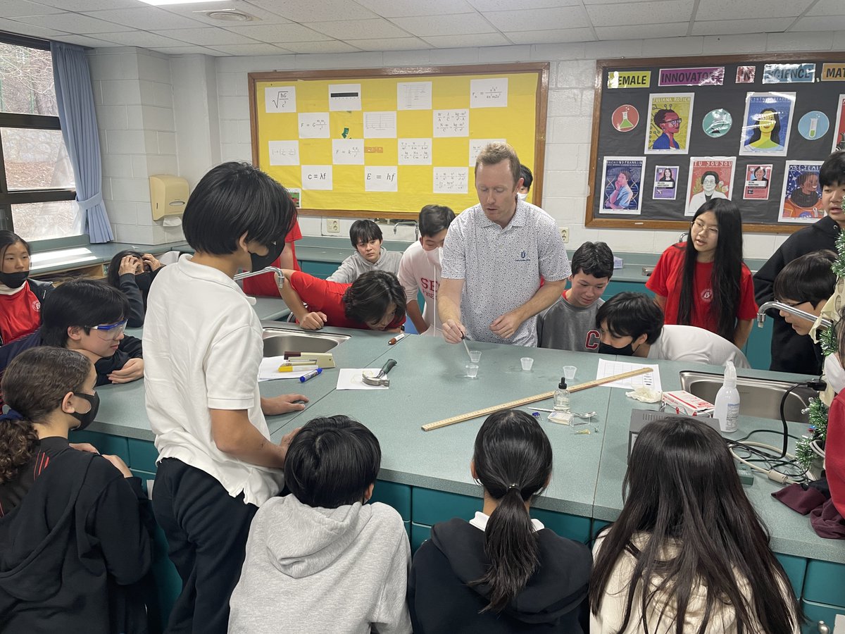 int_educator's tweet image. G7 teacher Mr. Bowins teaching engaged students about the surface tension of water #SFS1912 #issedu #asiaed #edchat #k12 #EARCOS #KORCOS