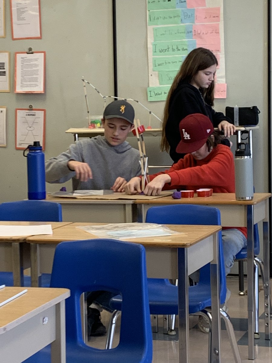 Our grade 7&amp;8's are hard at work making water slides!