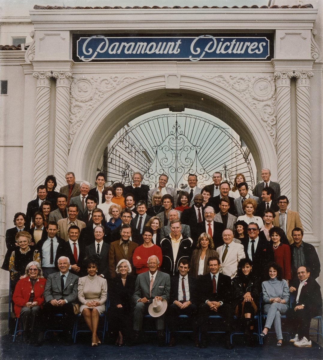 A large group of stars assembled outside the gate at Paramount Pictures in 1987.

How many can you name?