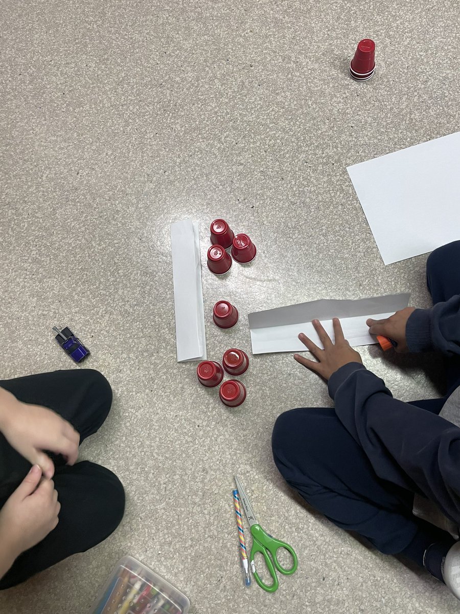 c_cicirelli's tweet photo. Our building unit in Science is underway. We are building a bridge for our cars to drive on using paper, cups and glue. 🚗📄 https://t.co/kpwfnufjBD