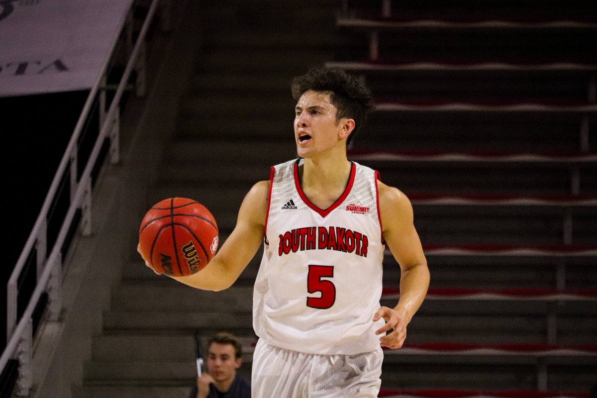 SDCoyotesMBB's tweet photo. Year 1⃣ ➡️ Year 4⃣

Kruz has now passed 100 games in his Coyote career. 💯

#WeAreSouthDakota x #GoYotes 🐾 https://t.co/sC7VMqfT2n