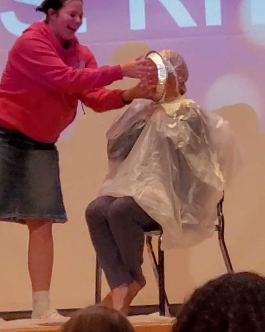MrsRhodes7th's tweet photo. Getting pied in the face today was a sticky,  smelly,  and fun experience! Happy to do a small part to earn money for important cancer research. Don't forget to register for @sgminithon! #ftk #RocketPride #beatcancer https://t.co/b9lIwyGDxw