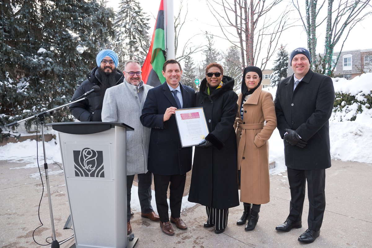 CityBrampton's tweet photo. Earlier today, Mayor @PatrickBrownOnt and #Brampton City Council gathered with residents to proclaim February as #BlackHistoryMonth with a flag raising ceremony. @BramptonFireES also revealed their wrapped fire truck in celebration of Black History Month. https://t.co/zjVJKb5jzW