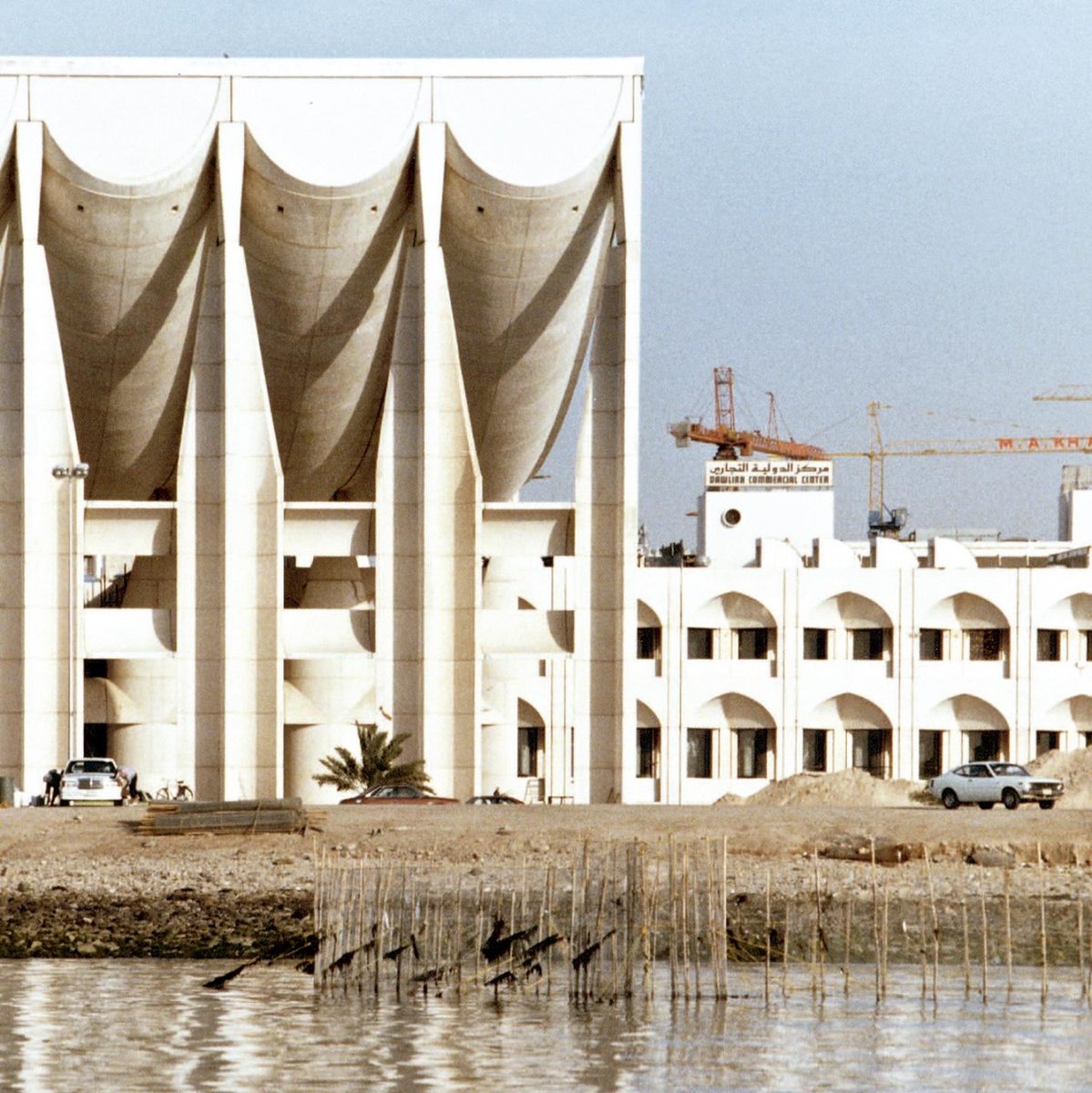 In 1961, the Emir of Kuwait declared a competition to design the National Assembly. A collection of 150 basic types were built. The building reflects traditional Islamic architecture. 

Source: arquitecturaviva
📷: Utzon Center