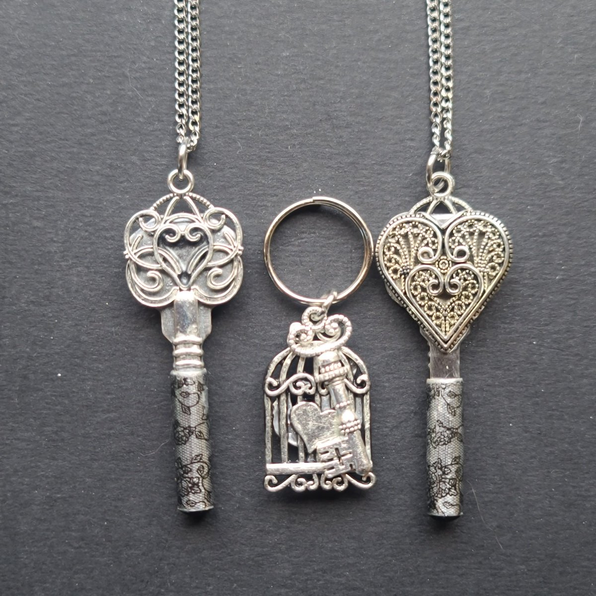 LockedinL's tweet photo. The LockedInChastity Etsy Shop is busy with Valentine's Day presents for Keyholders and there SOs.
The Real Chastity Key Necklace,  The Caged Blue Balls Necklace, and the Caged Cock Keyring all on the way for Keyholder presents.
Please order by Monday.
https://t.co/QLhs35gvC9 https://t.co/rbyKMew5rs