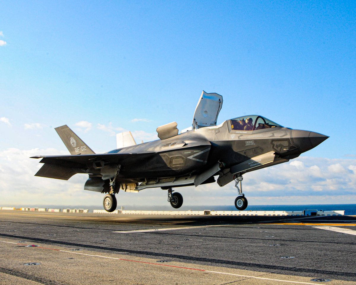 F-35s BF-01 and -02 landing on the USS WASP. (A. Rivard / USN)