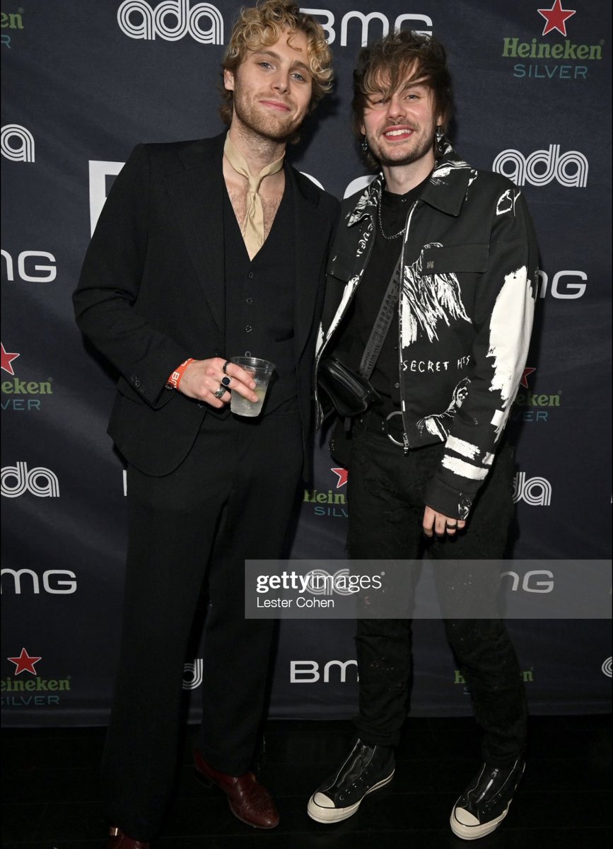 Tha5SOSFamily's tweet photo. Michael and Luke at BMGs pre-grammy party in LA! https://t.co/vL2UxEOLfD