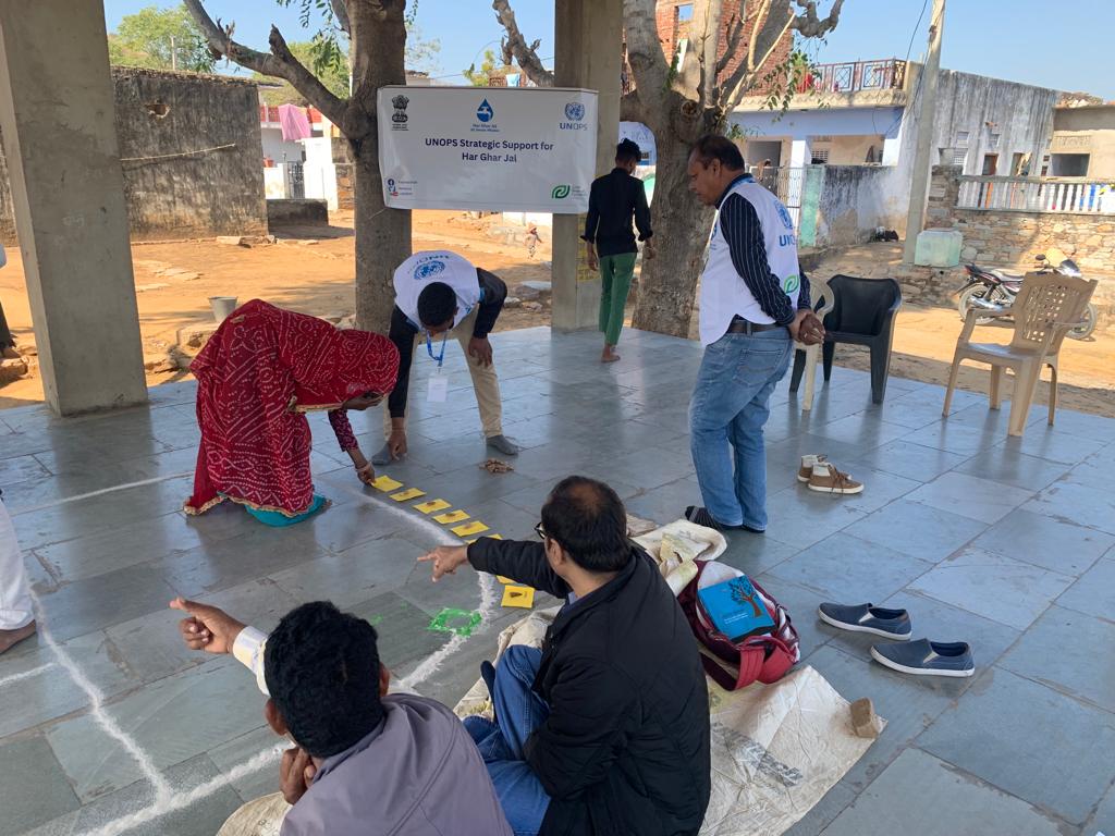 UNOPS_India's tweet photo. Vinod Mishra, Head of WASH, @UNOPS India facilitated Community Leave No One Behind (#CLNOB) with state &amp; district consultants at Village Piplod Narayan, Block Shah Pura, Distt Jaipur Rural, Rajasthan to interact with the community &amp; understand their expectations from @jaljeevan_ https://t.co/53umfbH84b