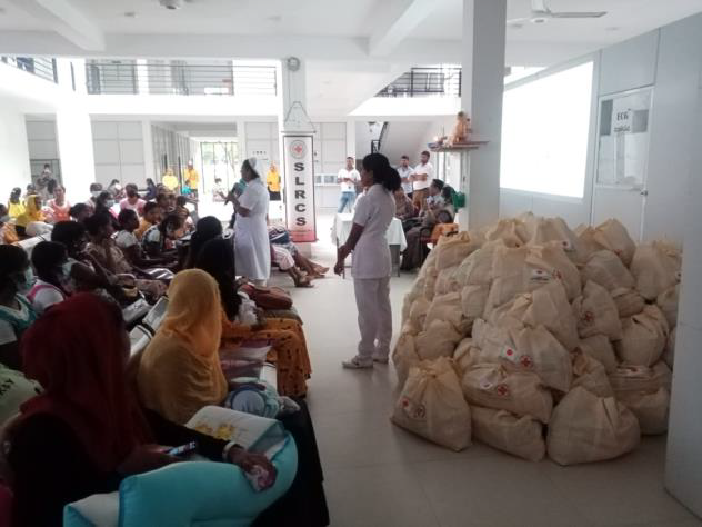 RegmiUdaya's tweet photo. Since the start of the economic crisis in Sri Lanka, @SLRCS has persisted in offering aid in the form of cash grants, hygiene kits, nourishing food packs, and support for the most vulnerable kids and teenage girls who have been adversely affected by the crisis. https://t.co/aX4aMRbTdu