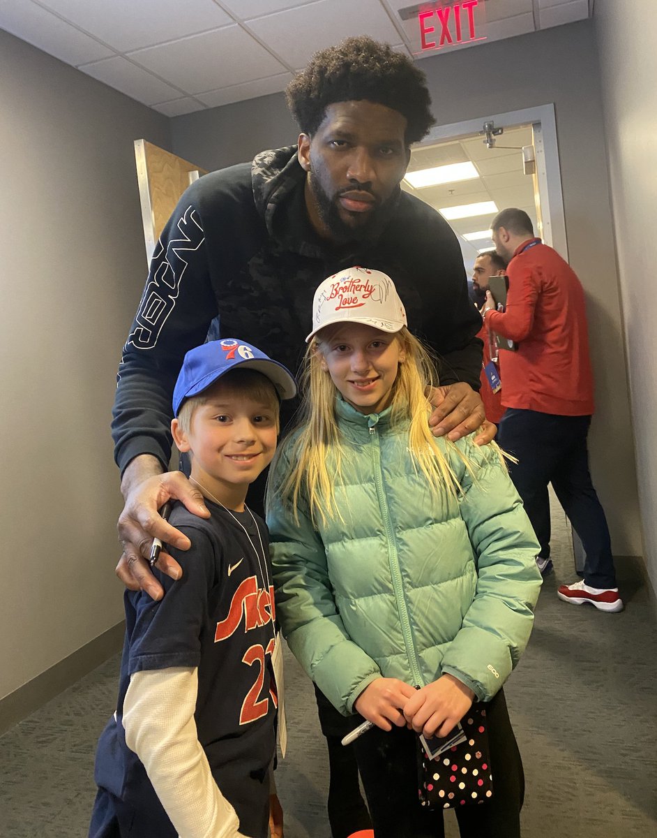 SCOTTeHENSLEY's tweet photo. Nearly 3 years ago, @JoelEmbiid and the @sixers contributed $1.3M to help @PennMedicine health care workers in the early days of the COVID pandemic. It was great to personally thank him last night and get this picture with my kids! https://t.co/g1AkPD0r0Y