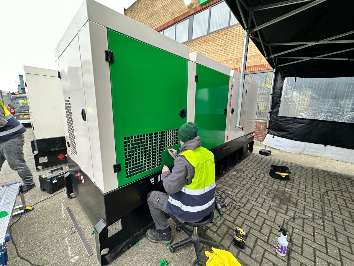 Signsandimaging's tweet photo. We are currently very busy wrapping these large generator units in green with branding for this client. It's cold outside but our fitters are hard at it to get done in time for our clients very tight schedule !!! We don't just do signs but wrap also !! https://t.co/4bRxeAsIiE