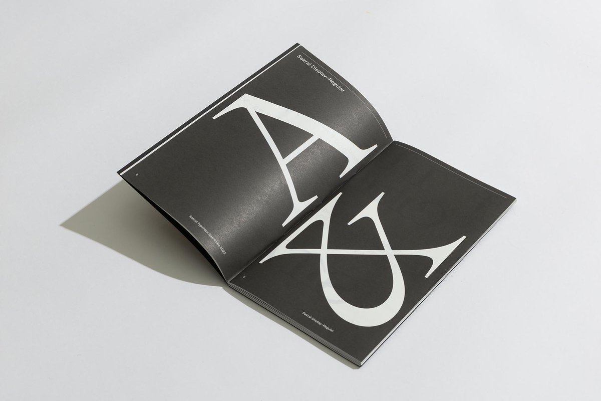 fuerte_type's tweet photo. Sakral specimen, designed by PAY2PLAY, China, printed w metallic gold foil stamped and dos-à-dos binding featuring Sakral Display on one side and Fuerte's upcoming release: Sakral Text, on the other side.
.
#typeface #specimenbook #fonts #typeinuse #graphicdesign #newrelease https://t.co/OcX47HY8PU