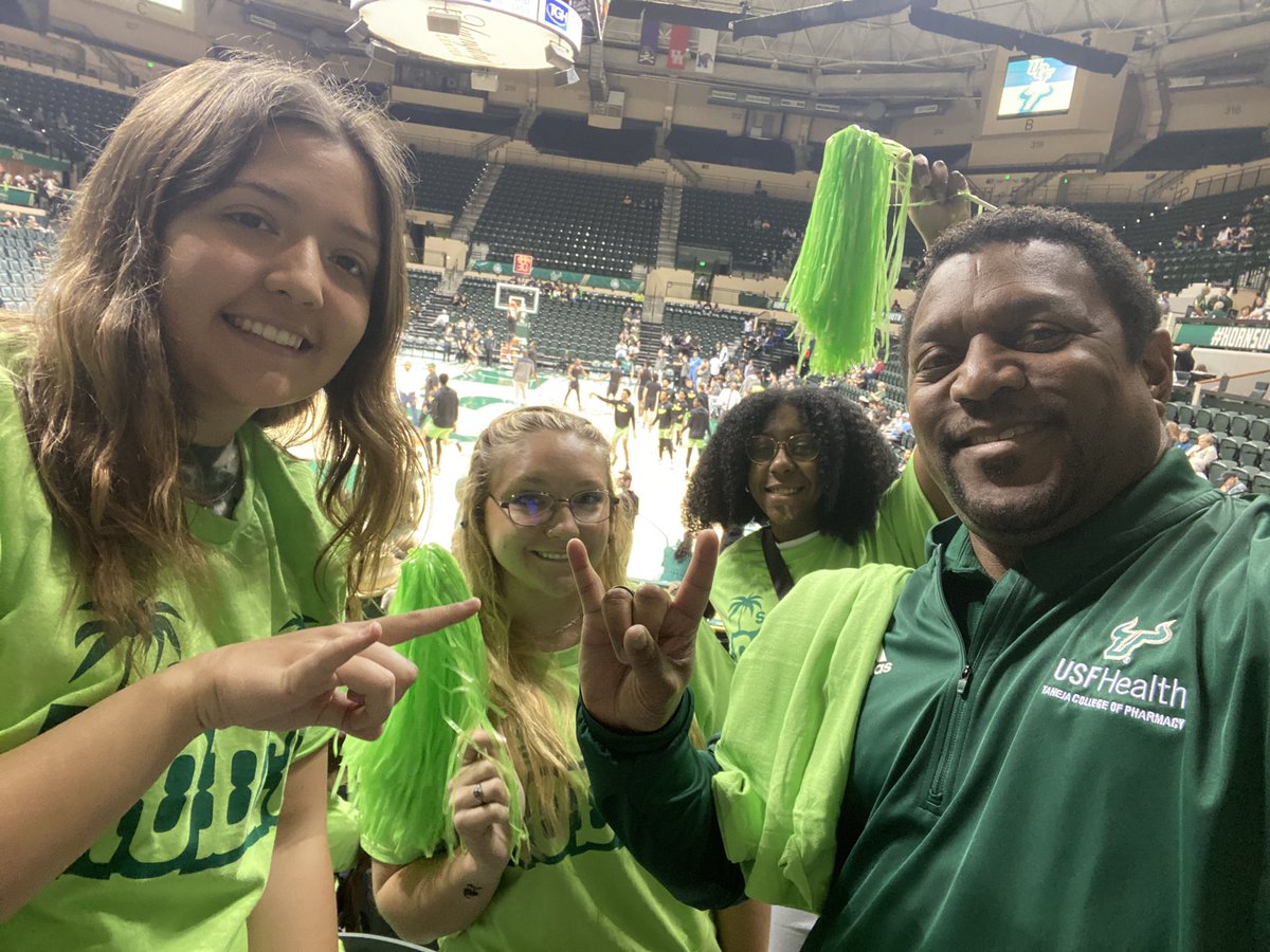 futuristpharmd's tweet photo. Dean @KevinBSneed from @USFCOP hanging out with the #SOFLORodeo student section at the @USFMBB game against UCF! Found plenty of future @USFCOP @USFHealthMed @USFHealthNurse students enjoying the game! #GoBulls #LetsMakeItHappen 🤘🏀 https://t.co/6kunztb97o