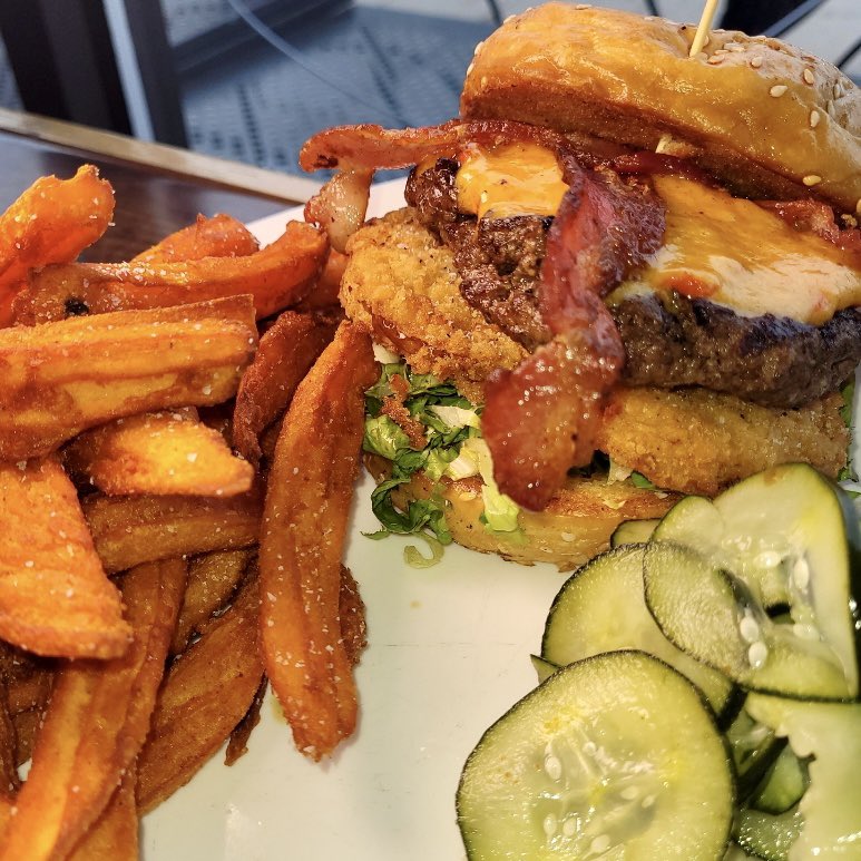 sinkburger's tweet photo. The Recruiter! Made special for @DeionSanders 🤩This southern-style burger is cooked to perfection, topped with pimento cheese, fried green tomatoes, bacon, and shredded lettuce, and served with your choice of side and our yummy house-made pickles 😋
#youcoming #WeComing https://t.co/eIE6LAY78D