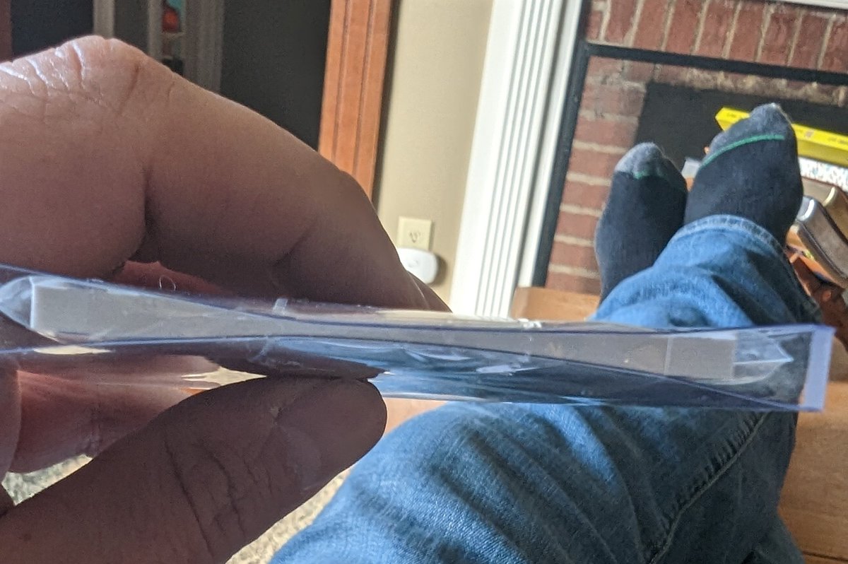 CarolinaCardEx1's tweet photo. If you're shipping a thick card, this is absolutely not necessary. Tape is one thing, but to squeeze it like this is brutal. #TeamBag https://t.co/lFRoDozj7C
