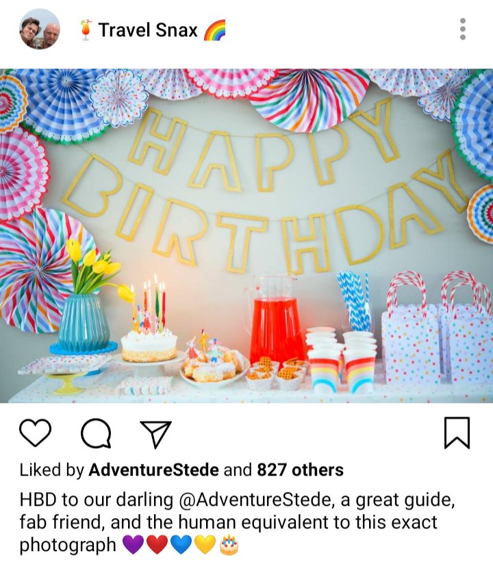Lucius' IG: Picture of happy birthday banner bordered in coloured fans, in front of a table of rainbow cups, gift bags, cakes, juice. Caption reads "HBD to our darling @AdventureStede, a great guide, fab friend, and the human equivalent to this exact photograph" 