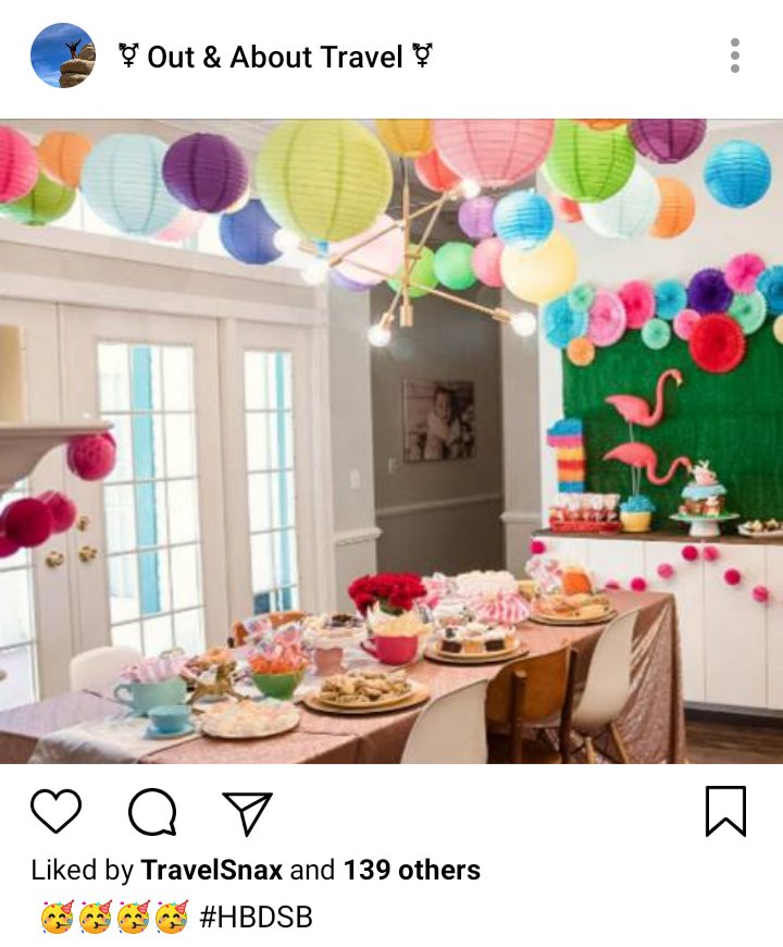 Olu and Jim's IG. Photo of dining room designed for a birthday, long table, flamingos, lanterns of every colour. Caption reads "🥳🥳🥳🥳🥳" 