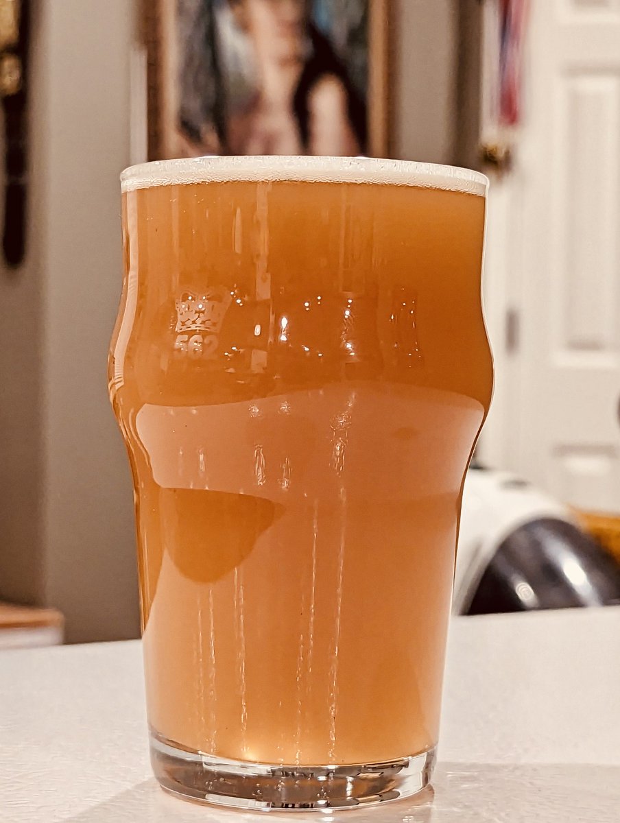 Loose Lucy Hazy IPA Homebrew orange color from the honey malt fermented under pressure (8psi). 7.6%ABV.