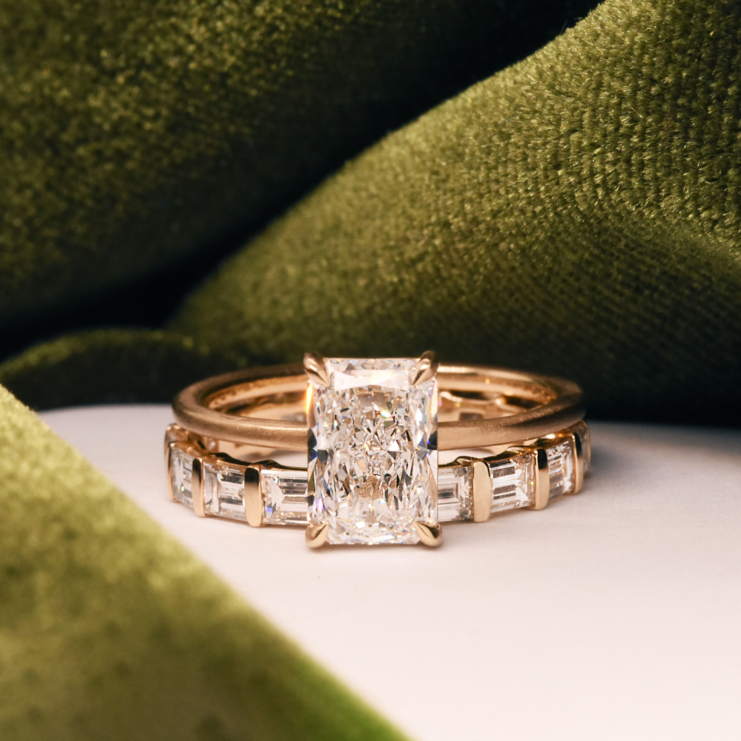 The perfect wedding set.
.
#engagementring #engaged #engagedmentrings #engagementringset #engagement #elongatedradiantcut #whitediamondengagementring #baguetteband #baguettediamondring #anniversaryband #diamondanniversaryband #goldrings #goldanddiamondring #whitediamonds #brideto