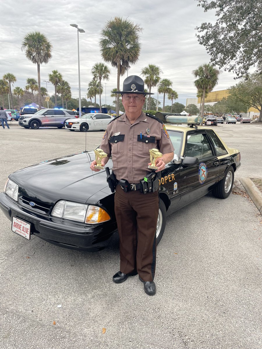 FHPOrlando's tweet photo. Our FHP Retro marked vehicles also took home two trophies for our 1993 Ford Mustang &amp; 2002 Chevy Camaro! #FHPAuxiliary #Throwback https://t.co/XdfxhRaR9Z