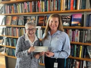 Mississippi Foundation has donated $25,000 to Pass Christian Main Street for the purpose of mitigating and correcting the problems with paint peeling off the walls of the Randolph Community Center. MPC area manager Meg Payment gave the check to PCMS president Anita Giani.