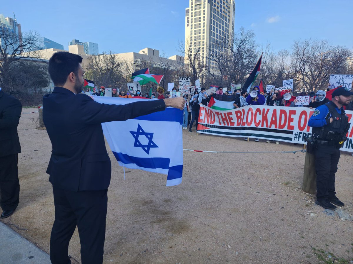 They are protesting against Israel here in Austin outside the IAC conference... so I came with the Israeli flag to stand in front of them🇮🇱