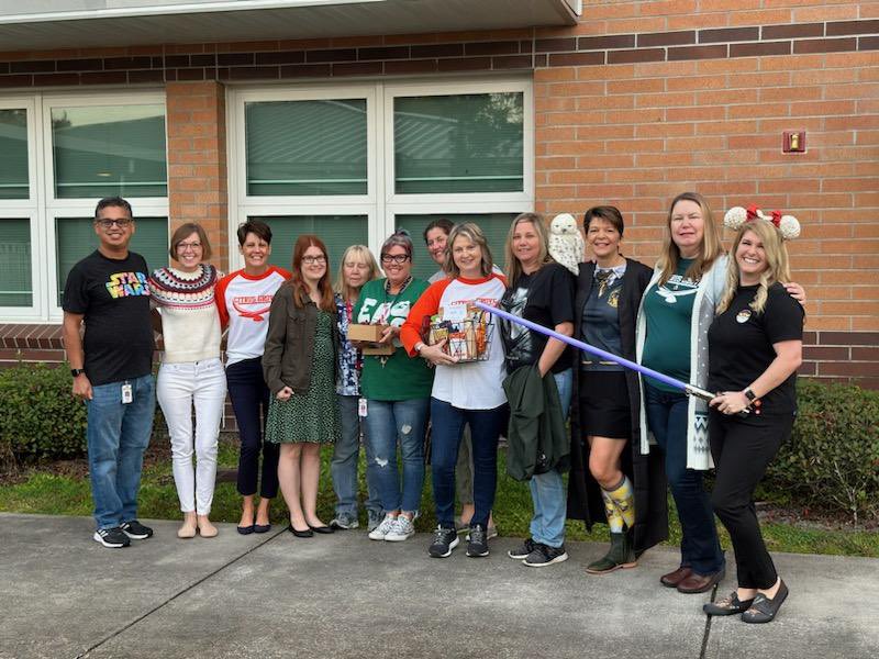 We had the best time at the #VolusiaTOTY banquet! I am so grateful to my <a href="/CitrusGrove_VCS/">Citrus Grove Elementary, Deland FL</a>  colleagues for their outpouring of love and support all week long. Special thanks to our admin dream team, <a href="/JenP_Williams/">Jen Williams</a>, Mr. Martello and  <a href="/eah_harris/">Erica Harris</a>. 🧡💚🍊🦅