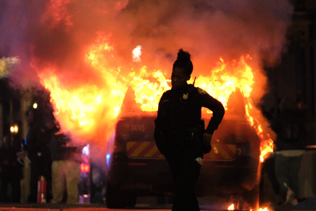 Atlanta right now - cop car on fire as they try to shut down the Cop City protests.