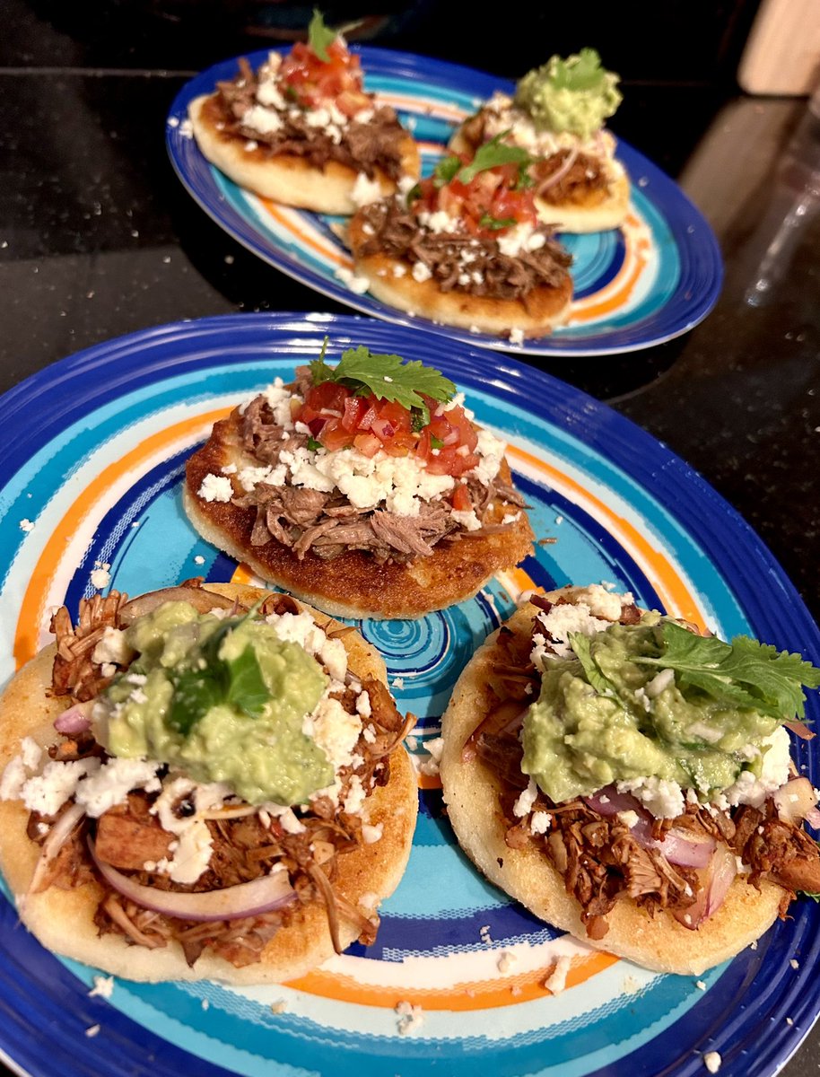 CaitlynPhD's tweet photo. Life hack: leftovers (here jackfruit birria, pot roast, and half a squashed tomato) are wonderful served with arepas and fresh guac #chemistswhocook https://t.co/UtEvjqTKHJ