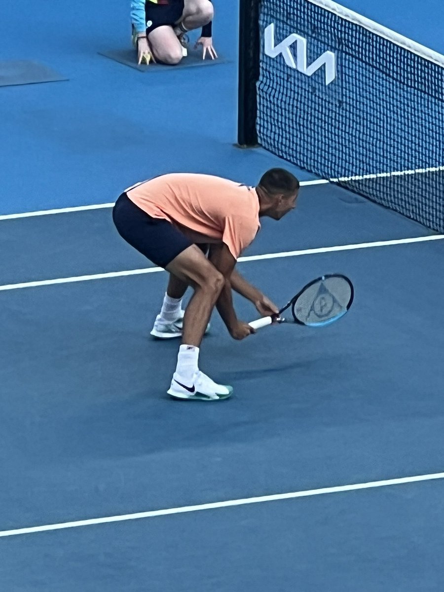 Le_Rat_Hole's tweet photo. @AlexeiPopyrin99 squatting like a beautiful baby giraffe taking a drink in the savanna. #precious #AusOpen https://t.co/TY4NhNitKx