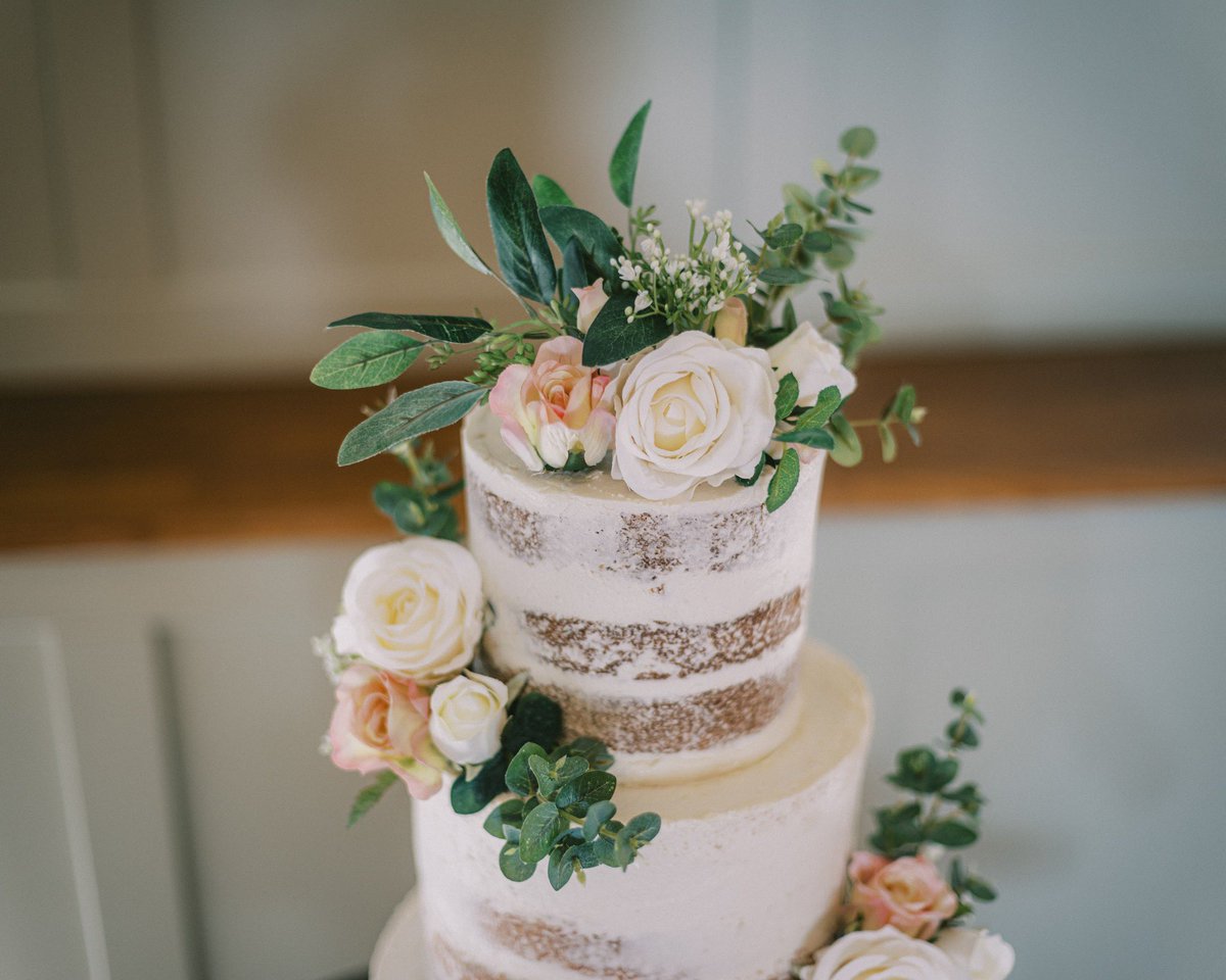Back on a very hot day in August, I delivered this Semi-naked wedding cake to Apton Hall in Essex, a journey that took well over an hour.

A big thank you to THE HUMBLE PHOTOGRAPHY CO. for sharing these amazing photos with me that show the cake remained perfect though out the day