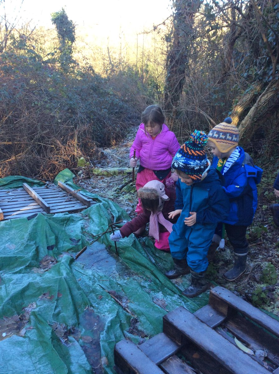 HambrookSchool's tweet photo. We celebrated Chinese New Year and 'The Year of the Rabbit' in Forest School this week by checking on our rabbit burrows and making dragons out of leaves and sticks. #Hambrook1 then enjoyed playing with the ice before warming their hands with a hot drink! https://t.co/JKJivqmYOV